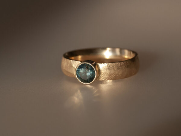 Teal Sapphire Hewn Band Solitaire