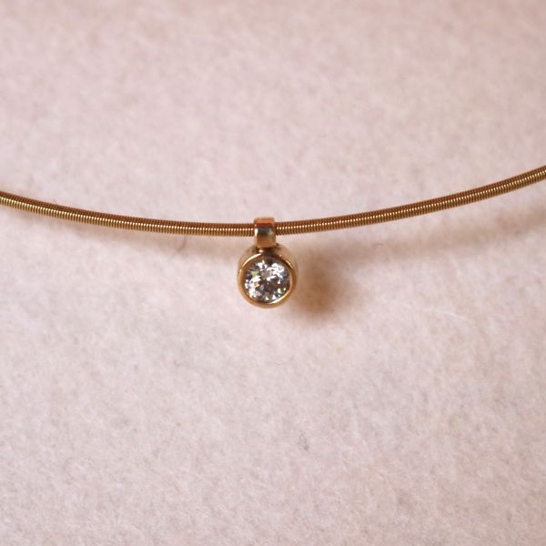 Bezel-Set Diamond Pendant